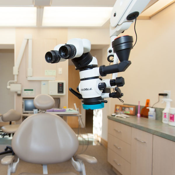 A surgical operating microscope used for microscopic enhanced dentistry