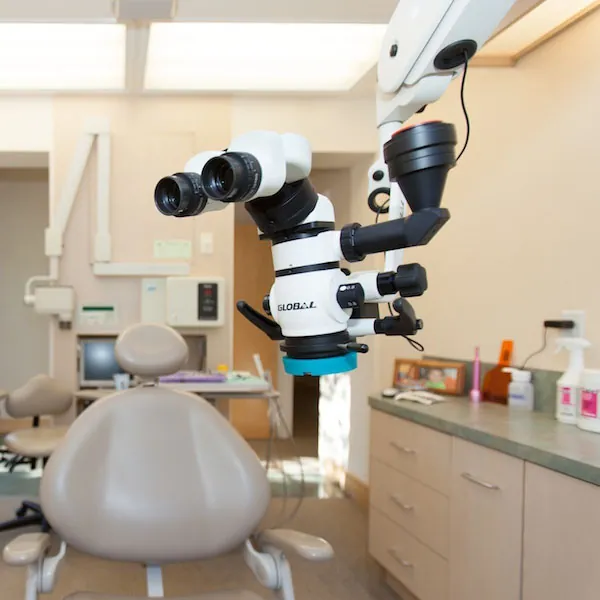 A surgical operating microscope used for microscopic enhanced dentistry